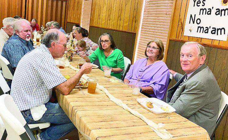 Enjoying meal at Old Bethel’s 175th Homecoming, Oct. 1 were church members. At right is Brother Richard Kaufman.