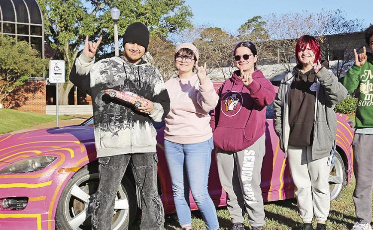 Nelson Tamez is designer of the 2024 Mazda art car, which he and a team of students executed. From left are Tamez, Harlee Manry, Tatum VanderHey, Koda Shoemake and Cameron Murphy.