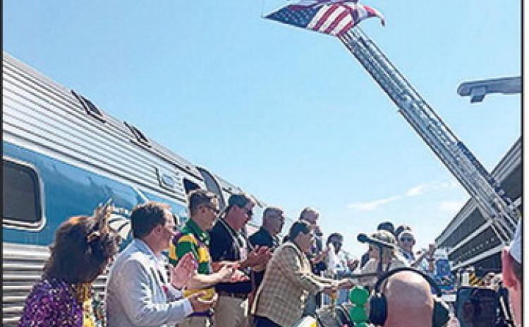 Lt. Gov. Billy Nungesser is welcome by the crowd at the Gulfport train station as Amtrak’s Mardi Gras Service makes its inaugural run between New Orleans and Mobile. (Photo credit: Office of the Lieutenant Governor)