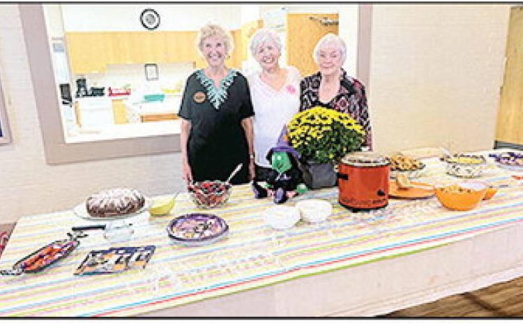 Hostesses for Lesche’s October meeting were, from left, Stephanie Kautz, Sue Keller and Jo Lapeyrouse.
