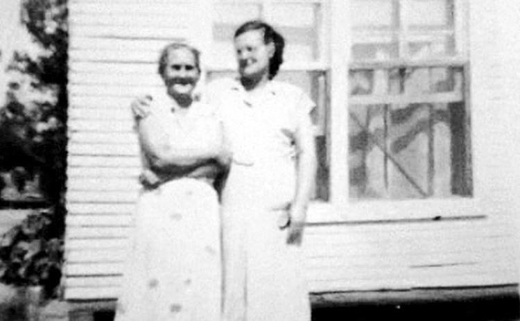 Standing on front of the Desadier Schoolhouse are Marie Zeline Laurenaudier and her daughter Sileman Ezernack Waters. Zeline was the mother of Louella Waters Desadier, the grandmother of Chief Rodger Collum.