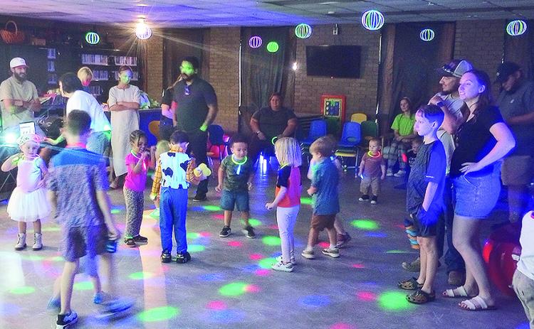 Children attending the NPL’s first Baby Rave were little more than a blur of motion on the dance floor.