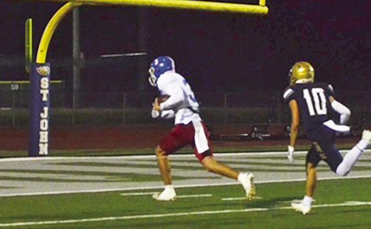 On Thursday, Nov 13, the #21 seeded St. Mary Tigers strolled past the #12 seeded St. John Eagles, 30-14, and are set to play #5 seeded Ascension Catholic Friday at 7 p.m. in round two of the state playoffs in the Division IV Select Bracket. Pictured is St Mary’s headed into the end zone during the Nov. 13 game. Photo by Jory Dupont