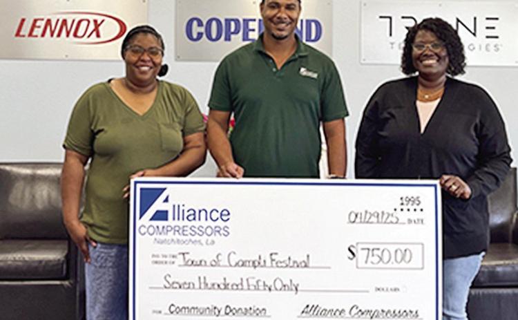 Mayor Katrina Evans received a grant for $750 for the town of Campti for the Smokin’ on the River Festival From left are Markisha Grayson, training specialist Joseph Bayonne and Evans.