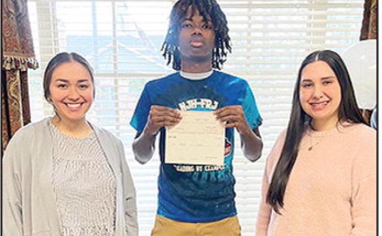 BOM was proud to support TaJarrius Bowers on his journey to the Junior High National Career Development Conference in Indianapolis, IN. From left are BOM’s Syddah Shults, Bowers and BOM’s Gracie Borders.