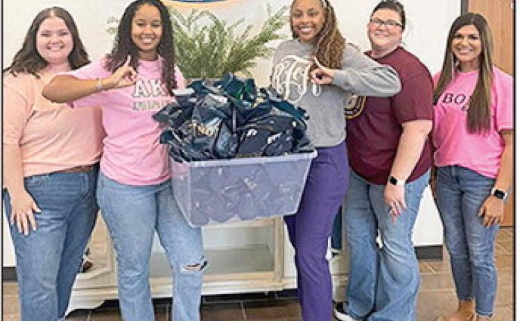 BOM bank donated 55 goodie bags to the Alpha Kappa Alpha Sorority, Inc. —Rho Beta Omega &amp; Eta Chi Chapter’s Denim and Pearls Leadership Brunch. Pictured from left are BOM’s Nicole Williams and Marie Nelson, Raven Fields, BOM’s Angela Taylor and Genevieve Loe.
