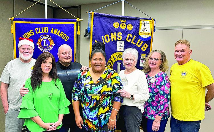 From left are Lion Bill Buckley, Natchitoches’ Peanut Butter and Jesus organizers Lynette Walsworth, Mark “Brother Peanut” Walsworth, Lynette Walsworth and Sonya Jones, Lions Club Board Member Mimi Stoker, President Nicole Connell and Board Member Jerry Silmon.