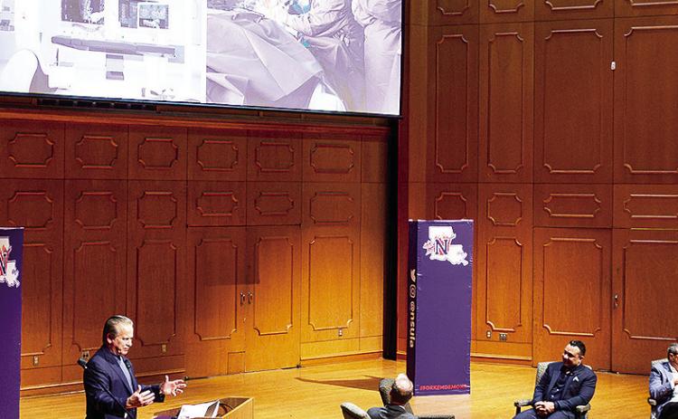 Dr. Julian Bailes, left, discussed how AI technology will transform medicine and healthcare at the “Leadership in the Age of AI” forum at NSU March 19. Seated are Dr. Greg Handel, moderator, and panelists Dr. Neilank Jha and Monty Chicola.