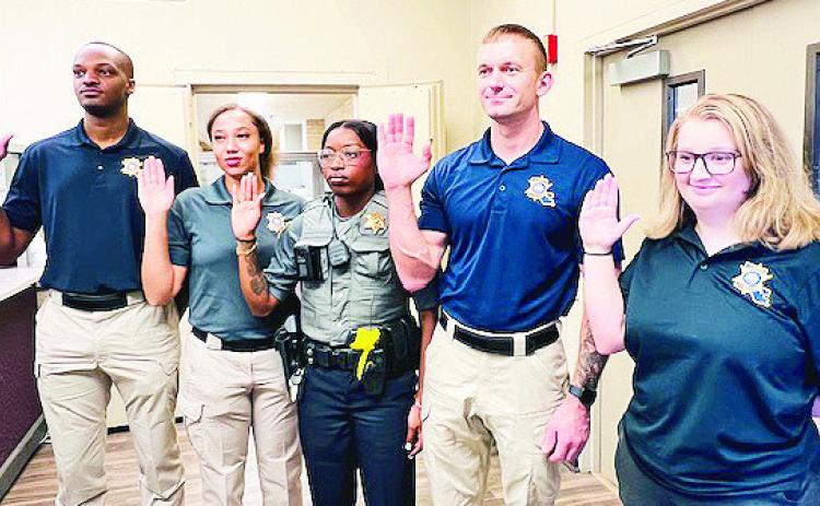 Sheriff Stuart Wright introduced the newest members of the Natchitoches Parish Sheriff’s Office family. From left are Dep. Mikerra Evans, School Resource Officer; Dep. Kendall Murray, Patrol Division; Dep. Jimmy Fife, Patrol Division; Dep. Hyacinth Frank, Patrol Division; and Dep. Hannah Derranger, Human Resources Administrative Assistant. See Story Page 3A.