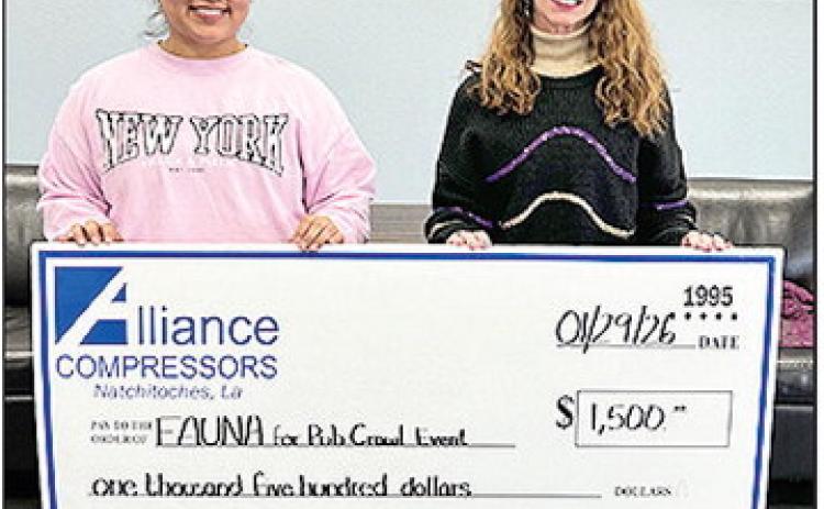 Alliance Compressors donates $1,500 to FAUNA (Friends All United for Natchitoches Animals for the h 11th Annual Pub Crawl. Pictured are Alliance Compressors HR Recruiter)Nidia Mendez and FAUNA Board Member)Kathy Owsley.