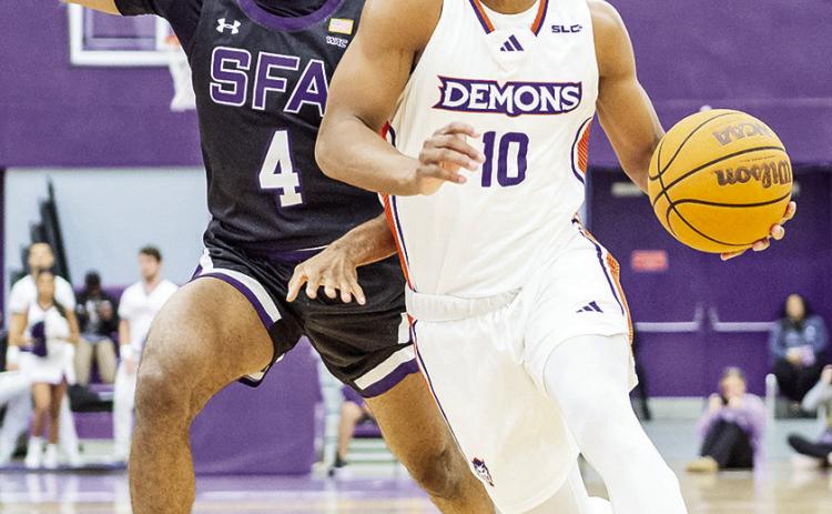 Cliff Davis (10) led Northwestern State with a career-high 23 points Monday night in a loss to SFA. Photo by Chris Reich/NSU Photographic Services