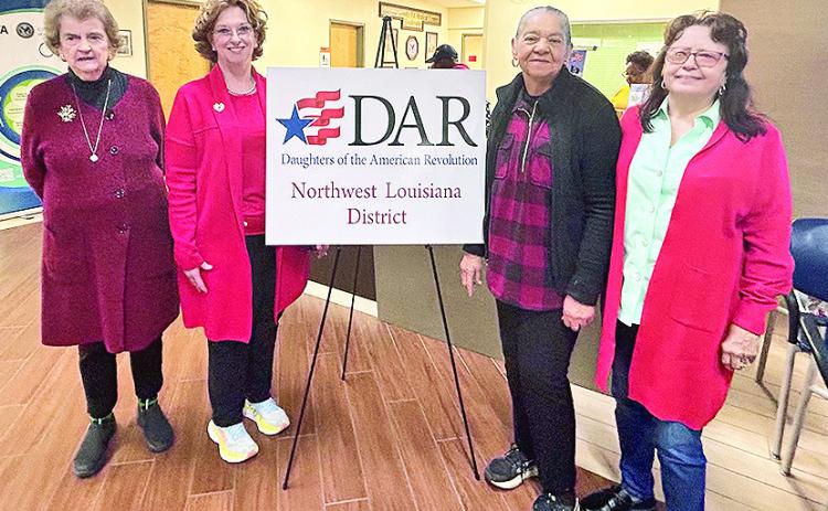 The Cane River Chapter, Daughter of the American Revolution (DAR) were among those who hosted a Christmas party at the Overton Brooks Veterans Administration Medical Center in Shreveport. From left are Elaine Bacon, Peggy Aycock, Nazy LaCour and Martha Conde.