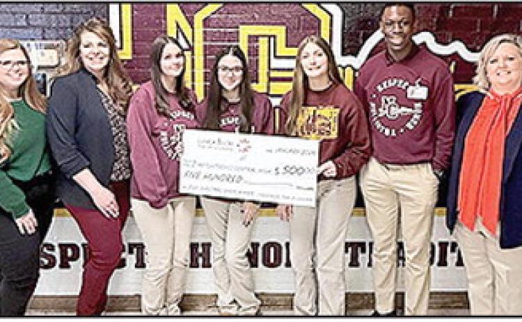 Natchitoches Central High School members pictured from left are Shelby Laborde, Paula Callender, Jenna Dove, Sophia Mitcham, Jada Drake and Oghenetano Eleyae, and Kim Haigh with Paragon Casino.