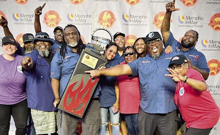 Daryl Walker aka Sweetie, the owner and chef extraordinaire of Sweetie’s BBQ, and his team won fourth place in World Championship Barbecue Cooking Contest held in Memphis, Tenn. earlier this month. The four-day competition is billed as the ‘Most Prestigious Barbecue Contest.”