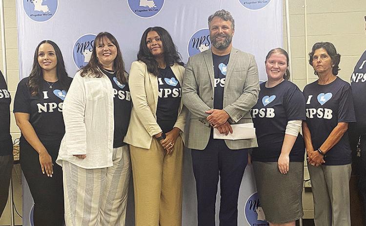 An internal team at the Natchitoches School Board Central Office is attacking truancy and absenteeism. From left are Dr. Darell Hampton, Jazmine Dilworth, Jennifer Ingram, Felicia Pinkney, Dr. Grant Eloi, Rayna Ferrell, Anita Dubois and Joey Miller.