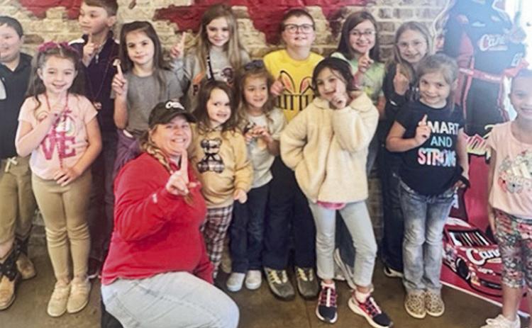 Provencal Students recently participated in a fundraiser to help update their school library with new books and supplies. Top sellers in each class were treated to lunch at Canes, where they were welcomed by Canes Manager Kathryn Beaudoin. Pictured are Kathryn Beaudoin, Brayden Montoya, Isaiah McComic, Aubree Lucas, Abigail Lofton, Joseph Gooden, Adriana Bennett, Ryleigh LaCaze, Aubrey Price, Macie McManus, Ruby Forrester, Brooklyn Outlaw, Cashlyn LaCaze, Aubrey Shaffer.