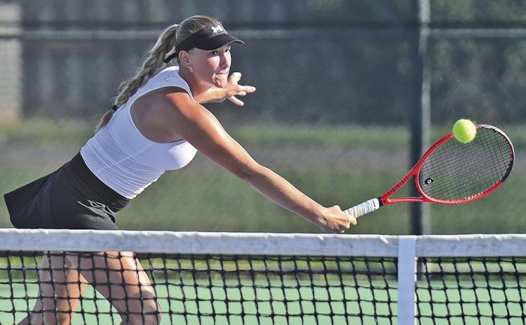 Photo: Freshman Zala Vnuk was one of three Lady Demons who went unbeaten in singles play in the Lady Demon Invitational.