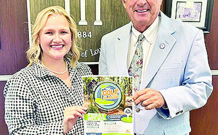 Rebecca Blakenbaker extended her thanks to Northwestern State University for their Silver Sponsorship of the Cane River Mini Golf Classic. Blakenbaker said not only did NSU help make the event possible, but are are helping shape the Outdoor Recreation Corridor, which includes the Cane River Discovery Center and the Grady Erwin Nature Preserve &amp; NSU Study Area. From left are Blankenship, president and CEO of the Cane River National Heritage Area and NSU President James Genovese.