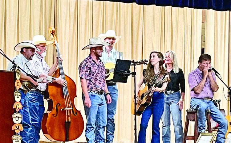 Bo Stewart, John Brittan, Kelly Stewart, Mark Birdwell, Clancy Stewart, Debbie Stewart, and Willie Stewart played and sang at the fundraiser benefit at Florien’s old school auditorium which was held for Bro. Rickey and Patsy Robertson to help with medical expenses incurred during his fight with pancreatic cancer.