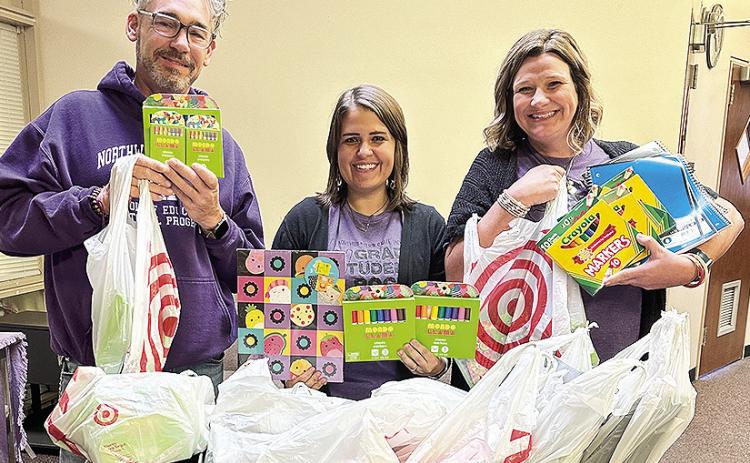 Faculty in the doctoral program in Adult Learning and Development Dr. Jonathan Elmore, Dr. Laura Beth Norman and Dr. Christy Hornsby supported the Cradle to College initiative by collecting items for families to engage in reading together.