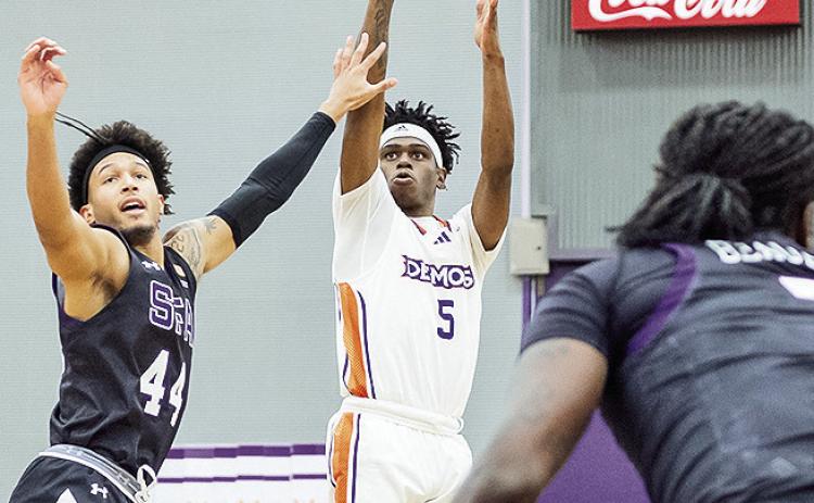 Ryan Forrest (5) led Northwestern State with a career-high 25 points against North Florida on Friday. Despite a great comeback, the Demons lost 80-74 .