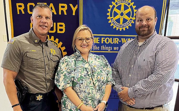 Rotarian with the Program Frank Fuller introduced the Interpretation Manager for the National Park Service Barbara Justice at the July 30 Rotary luncheon. Justice created a presentation summarizing A Long Journey: The Texas and Pacific Railway Depot. Pictured from left are Fuller, Justice, and Rotary President Jesse Taitano