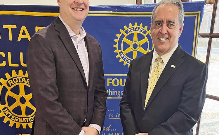 Rotary President Louie Bernard welcomed NSU Athletic Director Kevin Bostian at the Feb. 10 meeting. Bostian gave an overview for each athletic program. From left are Bostian and Bernard.
