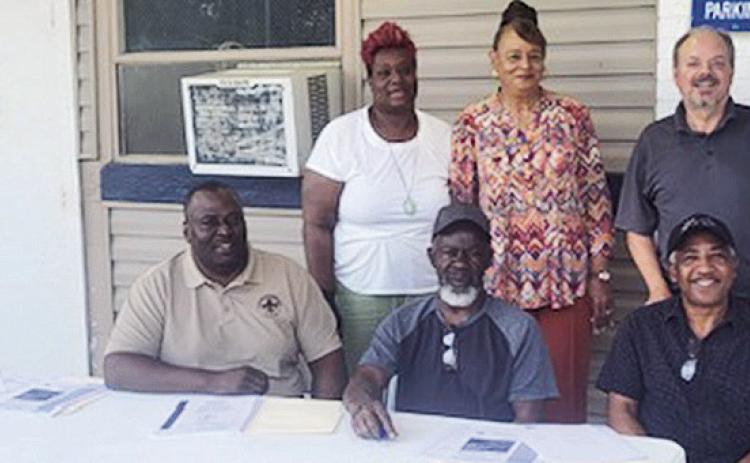 The Village Of Natchez held a meeting on May 16 for the selection team to look over the applicants that submitted RFQs for the engineering on a drainage and ditching project. The project is funded through the Louisiana Watershed Initiative Round 2 Grant in the amount of $1,035,000. Seated are Donald Forrest, Alderman Mckinley Hoover and Henderson Howard Jr. Standing are Pamela Harvey, Dr. Gloria Smith and Nick Veret.