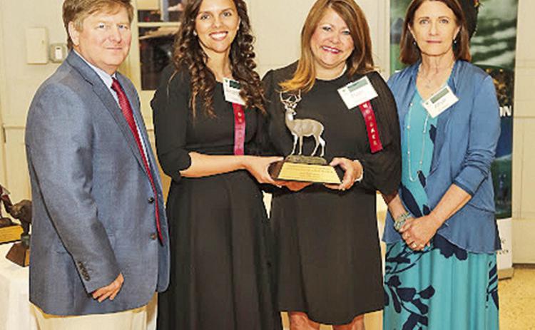 Natchitoches Parish 4-H agents Amanda Clark and Pam Pearce (center) are named Conservation Educators of the Year by the Louisiana Wildlife Federation.