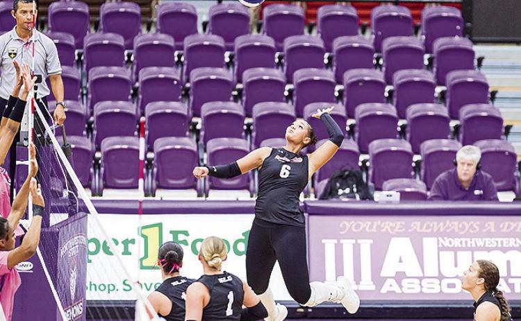 Olivia Bush goes for the kill in Saturday’s match against SFA at Prather Coliseum Photo by Chris Reich /NSU Photographic service