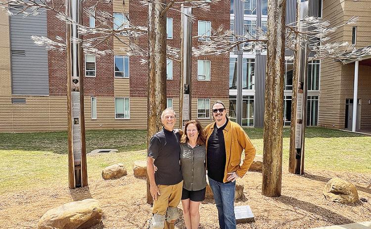 Artists Jeffrey Reed and Jennifer Madden met Chris King, principal lecturer of Art at LSMSA. Reed and Madden created the sculpture.
