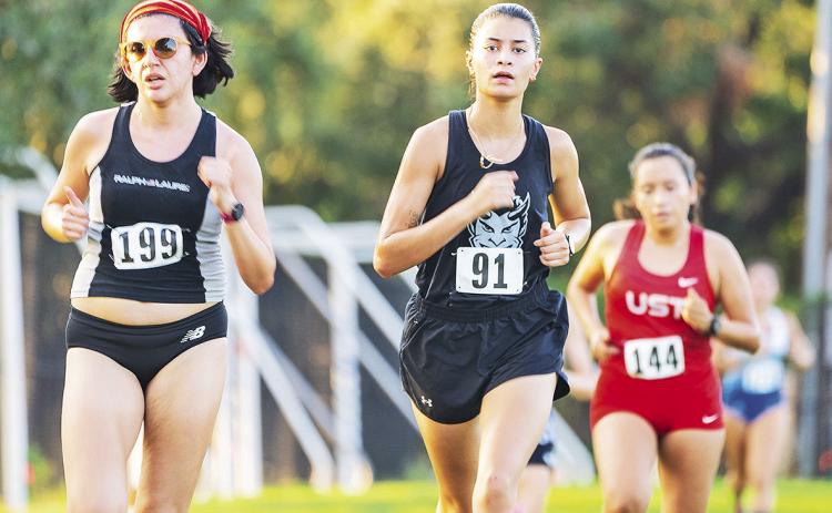 Lalaina Wood (pictured) smashed a personal best in the 5K at McNeese on Saturday, leading Northwestern State at the McNeese Cowboy Stampede. Photo by Christopher Richard