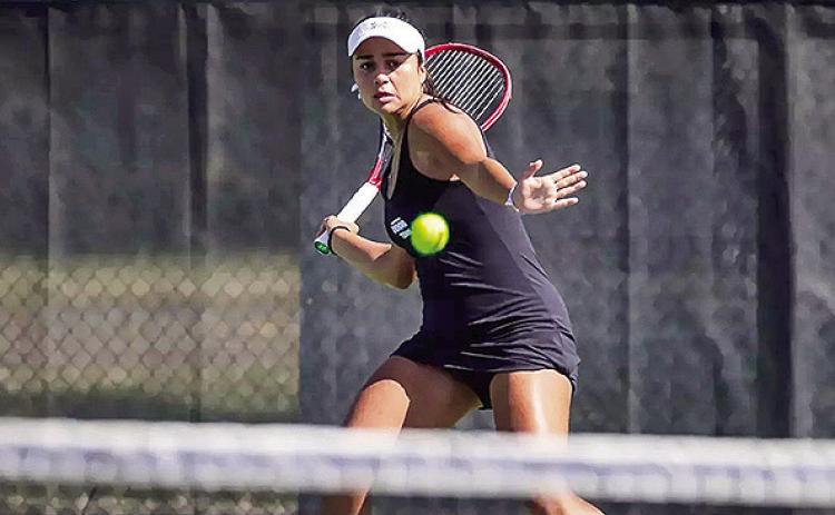 Junior Maria Farina joins the select Lady Demons to play in the Diving Eagle Invitational. Photo by Chris Reich, NSU Photographic Services