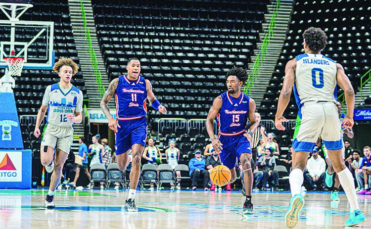 Chase Forte (15) brings the ball up against Texas A&amp;M-Corpus Christi alongside teammate Justin Wilson (11) on Monday night. Photo by Texas A&amp;M-Corpus Christi Athletics