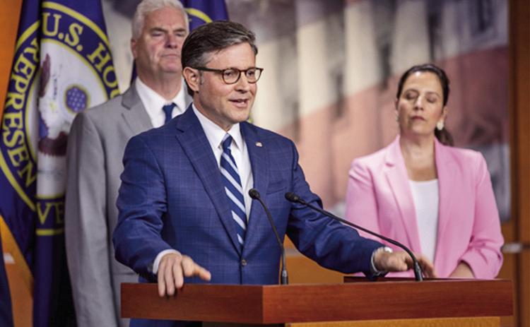 House Speaker Mike Johnson is standing at the podium during Tuesdays’ weekly House Republican Leadeship press conference addressing a number of topics.