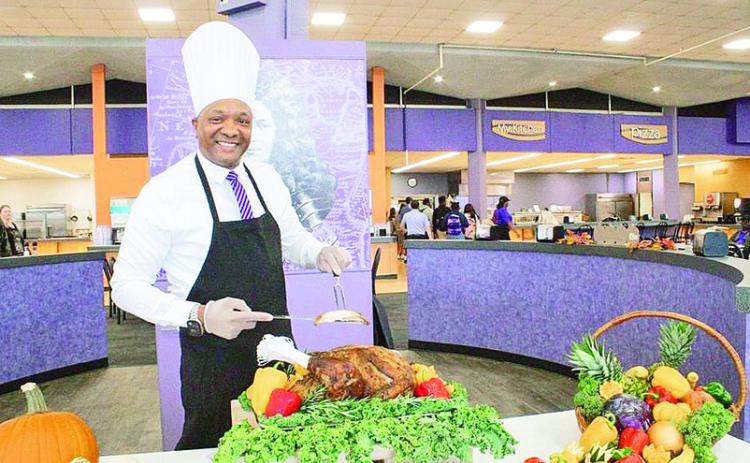 NSU president Marcus Jones sliced the turkey as faculty and staff came together last week to enjoy a traditional Thanksgiving feastand to wish the the Demon family a Blessed Thanksgiving. Northwestern State faculty, staff and students are off for the week and will return Monday.