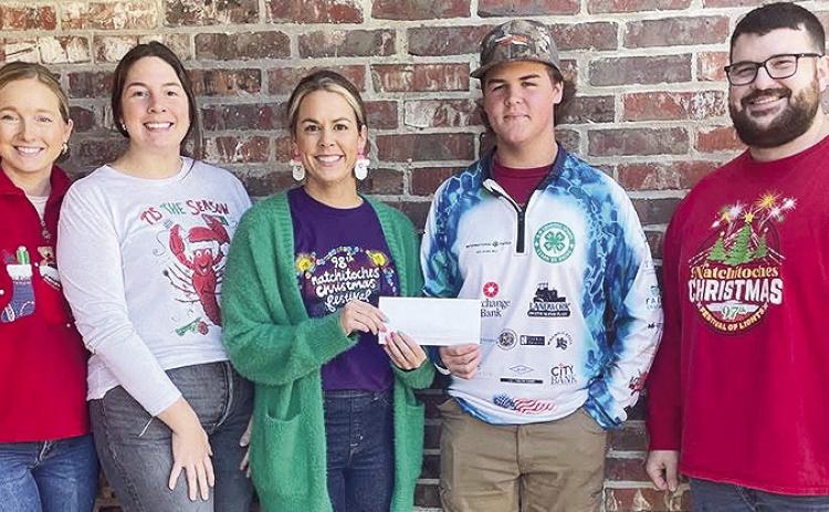 BOM makes a donation to the Natchitoches Parish 4H Shooting Sports team. Pictured from left are BOM’s Lori Lee, Claire Mayeaux and Carrie Hough, 4H Member Lane Gray, and BOM’s Logan Lambert.