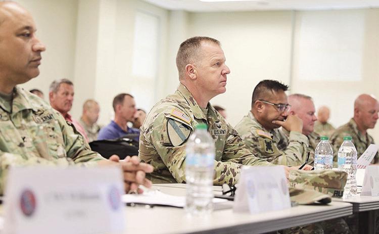 Maj. Gen. Thomas Friloux, adjutant general of Louisiana, listens to a briefing during the Louisiana National Guard’s annual Hurricane Rehearsal of Concept (ROC) Drill at the Armed Forces Reserve Center in Baton Rouge, May 21, 2025. The event brought together leaders and planners from across the LANG to refine hurricane response plans ahead of the 2025 season. U.S. Army National Guard photo by Staff Sgt. David Kirtland