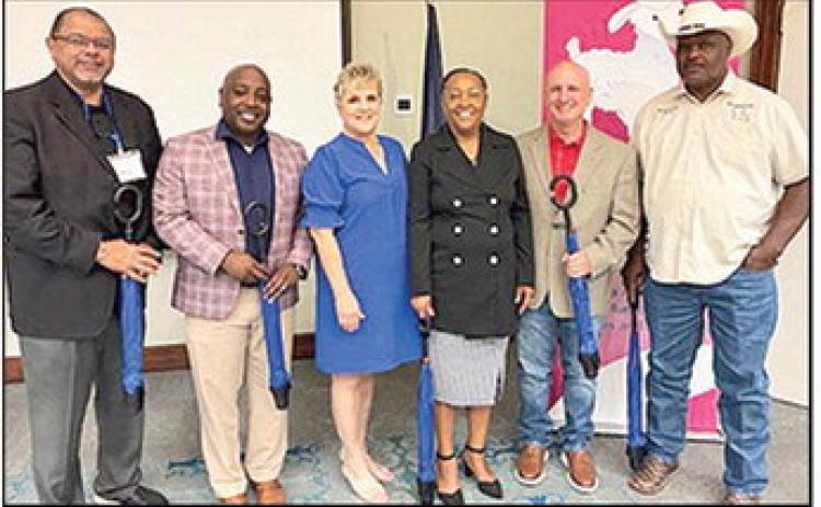 The Louisiana Association of Municipal Secretaries and Assistants (LAMSA) recently held their fall conference at the Cypress Bend Resort and Conference Center in Many. From the left are Mayor Julius Alsandor, Opelousas; Mayor Ronnie Williams Jr., Natchitoches; LAMSA President Roxanna Richard; Mayor Gloria Stewart, Pleasant Hill; Mayor Robert Hable Jr., Many; and Mayor Marvin Frazier, Zwolle.