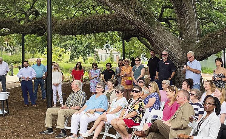 Dr. Steve Horton greats the crowd gathered Thursday afternoon for the dedication of the restored Pacale-Roque House located on the Cane River Lake downtown riverbank. Among the attendees were District 31 Senator Alan Seabaugh and his wife Laura, District 3 Parish Councilman Wayne Halm and District 1 City Councilman Eddie Harrington.