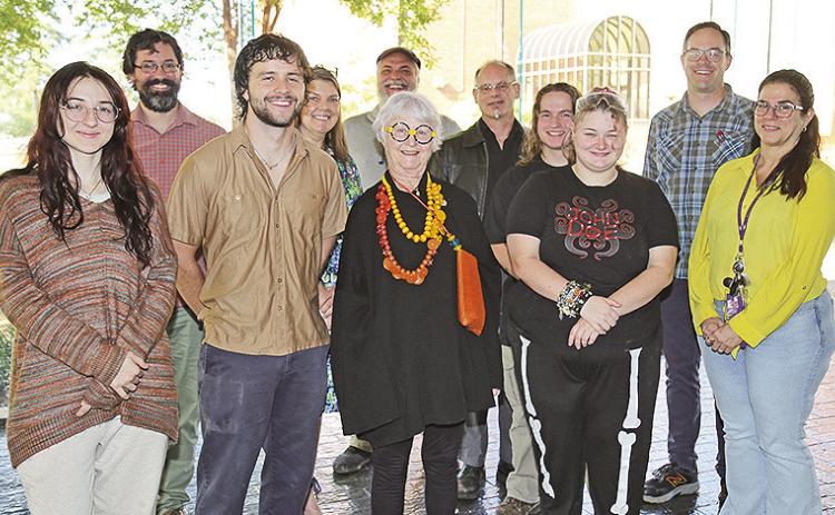 Carol Kirkland announced a planned gift to the NSU Foundation that will benefit students in the Department of Fine and Graphic Art. Students and faculty gathering for the announcement were, front row from left, Skye Dager, Derek Sarvis, Kirkland, Rex Cooper and Mirla Gonzales. On the back row are Sean Callander, Dr. Leslie Gruesbeck, Corbin Covher, Collier Hyams, Noah Martinez and Matt DeFord.