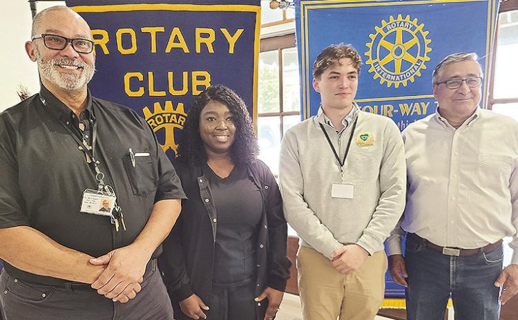 CEO and Chief Medical Officer Dr. Mark Guidry, Public Information Coordinator Colie Plaster and Director of Nursing Schrina Evans from the Outpatient Medical Clinic (OMC) spoke at the March 26 Rotary luncheon. The OMC is a federally qualified Health Center that focuses on primary care, dental and behavioral health. From left are Guidry, Evans, Plaster and Rotary President Joe Sers.