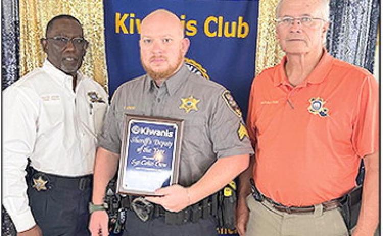 From left are Chief Dep. Darrel Winder, Kiwanis Sheriff’s Deputy of the Year Sgt. Colin Crow and Sheriff Stuart Wright.