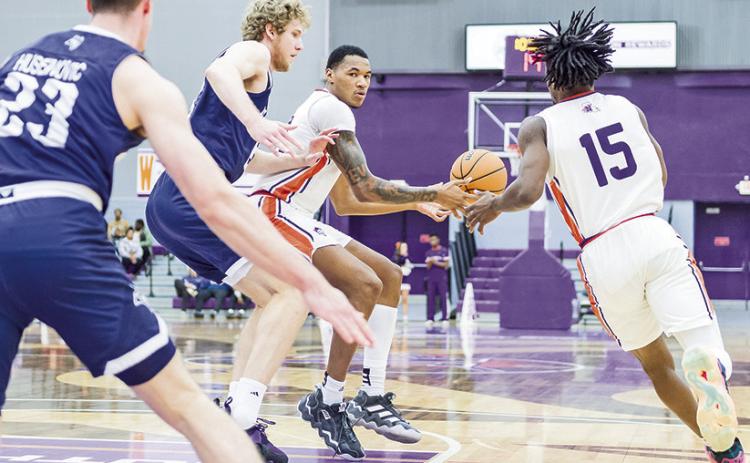 Justin Wilson (center) had a career-high 10 points in Saturday’s loss to Rice. Photo by Chris Reich/NSU Photographic Services