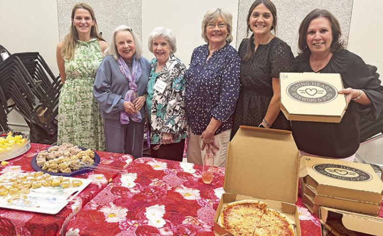 Helping serve the symphony members were, from left, Samantha Thomas, Marion Johnston, Mary Lou Brown, Cecelia Smith, Gina McCorkel and Tish McKnight.