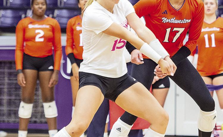 Ashlyn Svoboda digs a ball in a match against Nicholls. Photo by Chris Reich, NSU Photographic Services