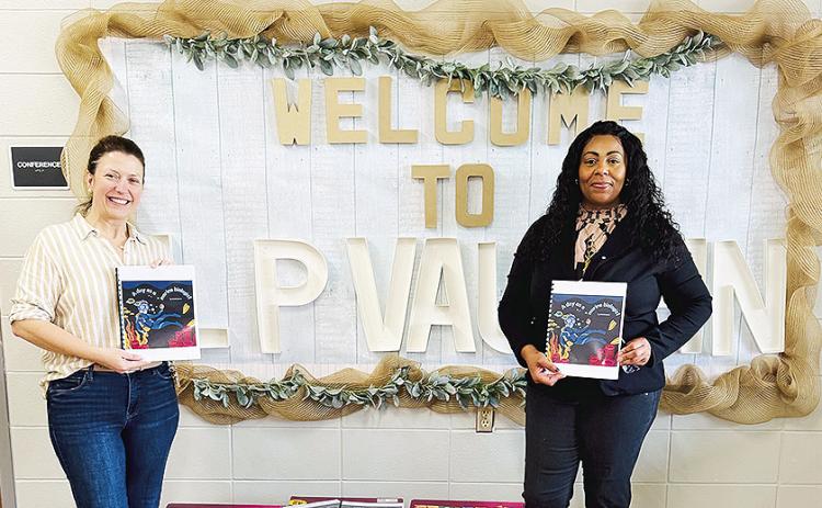 One standout contribution came from JAG member Christell Juarez, who authored a book titled “A Day in the Life as a Marine Biologist.” Her work, along with the others, reflects the creativity, effort, and dedication students put into the project. Holding copies of the book are, from left, Cori Manuel and Jacquelyn Rainwater.