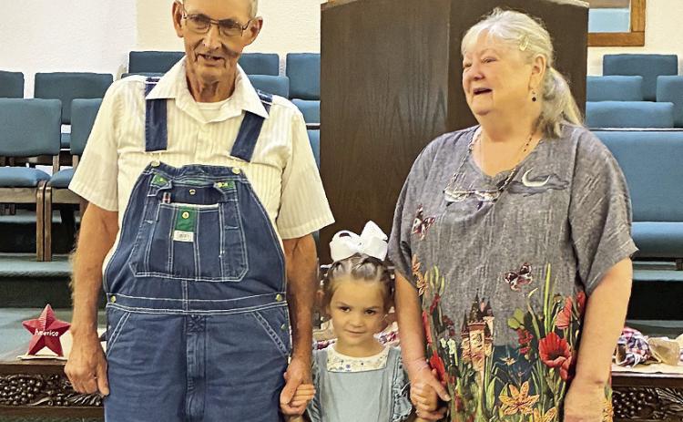 Old Bethel members sang Happy Anniversary to John and Lanell Settle. Their great granddaughter, Lucy, is in the middle. Old Bethel members sang Happy Birthday to Lucy.