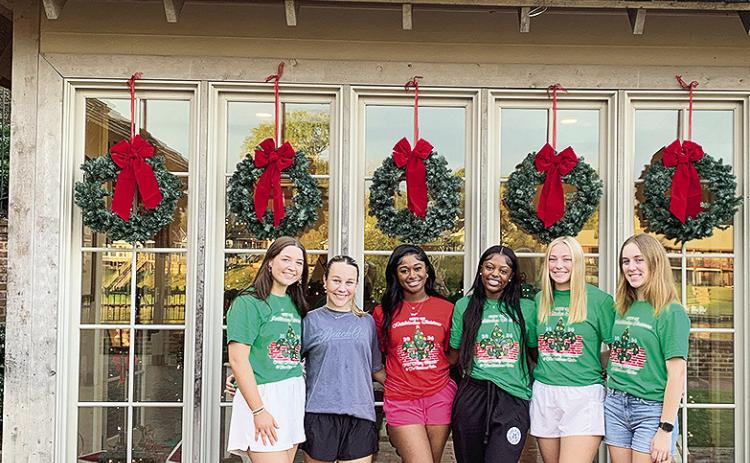 From left are Bess Stewart, Campbell Morrow, Miss Merry Christmas Layla Johnson, Ayla Payne, Destanee Stewart and Huntar Goings. Not pictured is Anderson Kelly.