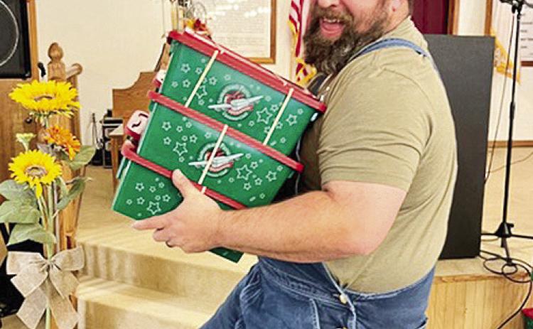 Jimmy Smith was very excited about helping with Operation Christmas Child Shoeboxes at Bellwood Baptist Church.
